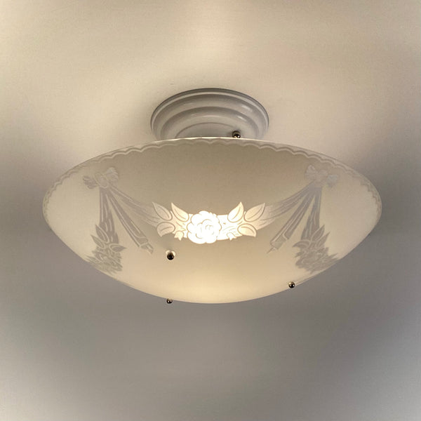 1950s semi-flush ceiling light with enameled floral glass bowl installed on ceiling