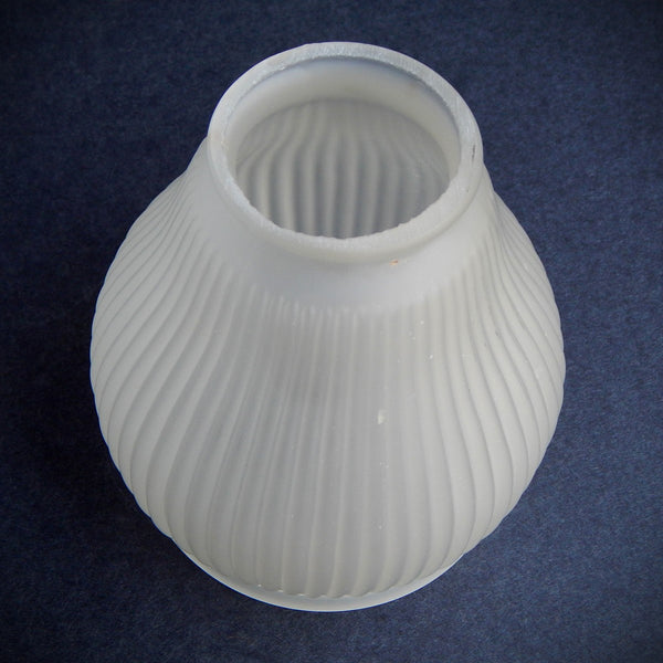 Vintage ribbed frosted glass light shade with bell-shaped form and satin finish, photographed from multiple angles against a dark background.