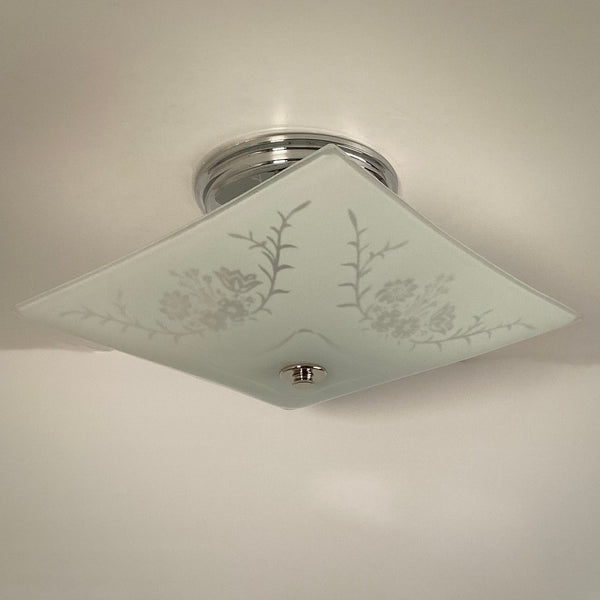 Vintage square frosted glass ceiling light unlit, highlighting etched floral pattern in glass