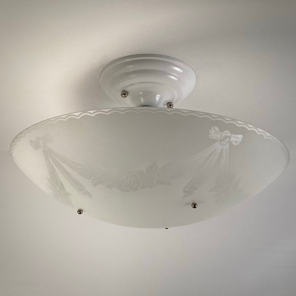 Unlit 1950s semi-flush ceiling light highlighting frosted enameled glass bowl