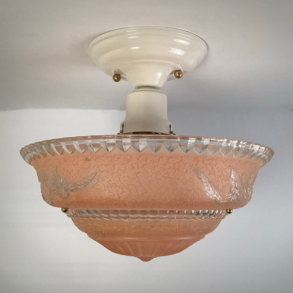 Side profile of peach floral etched glass flush mount ceiling light