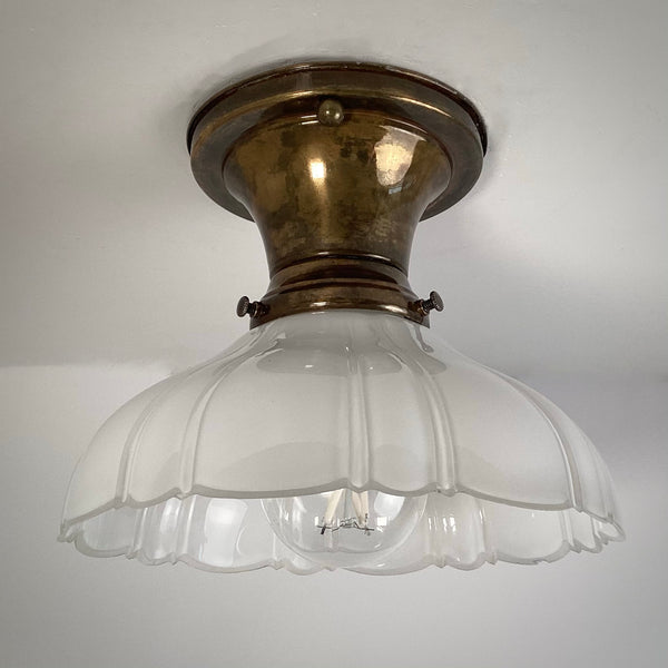 Antique brass flush mount ceiling light with fluted milk glass shade