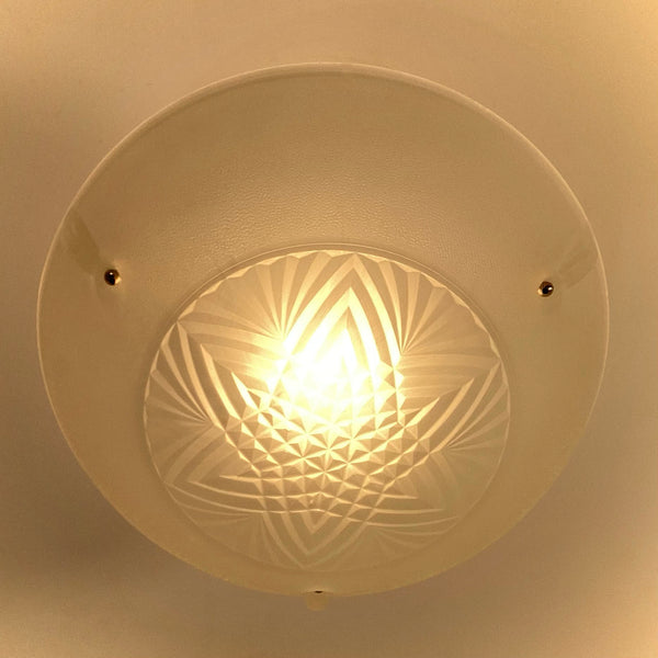 Bottom view of 1930s Art Deco frosted glass ceiling light featuring a geometric starburst pattern and powder-coated canopy by Vintporium