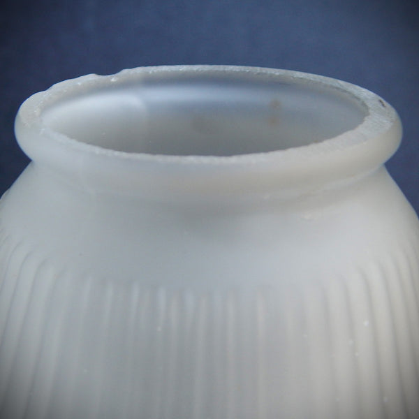 Vintage ribbed frosted glass light shade with bell-shaped form and satin finish, photographed from multiple angles against a dark background.