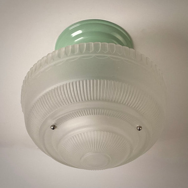 Vintage semi-flush ceiling light bottom view unlit, showing ribbed glass pattern and form