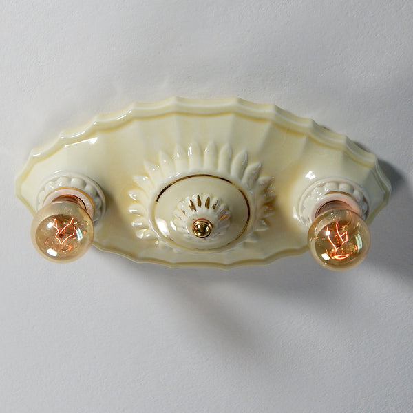 Vintage Flush Mount Uranium Glazed Ceiling Light Fixture  This beautiful antique ceiling light fixture is made of uranium glass glazed porcelain and features a classic Art Deco design. The fixture has been restored and features new wiring, sockets, etc. It has been cleaned and detailed and is ready to install. Available at www.vintporium.com