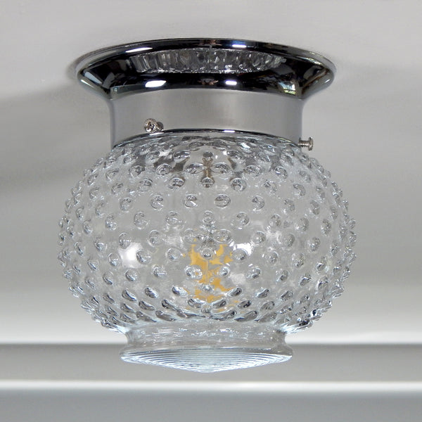 The term "hobnail" refers to the decorative raised bumps or knobs that adorn the surface of the glassware, resembling the shape of nail heads. Hobnail glass originated from Europe and was initially produced during the Victorian era in the 19th century. However, it experienced a resurgence in popularity after World War II, particularly in the United States.  Available at www.vintporium.com
