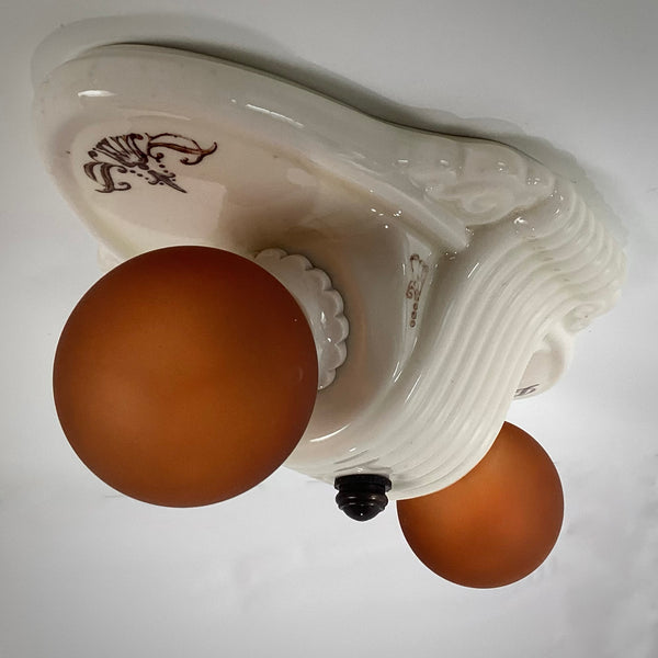 Vintage Flush Mount Porcelain Ceiling Light Fixture. This beautiful antique porcelain ceiling light fixture with uranium glass glaze features a classic 1930s design. Available at www.vintporium.com