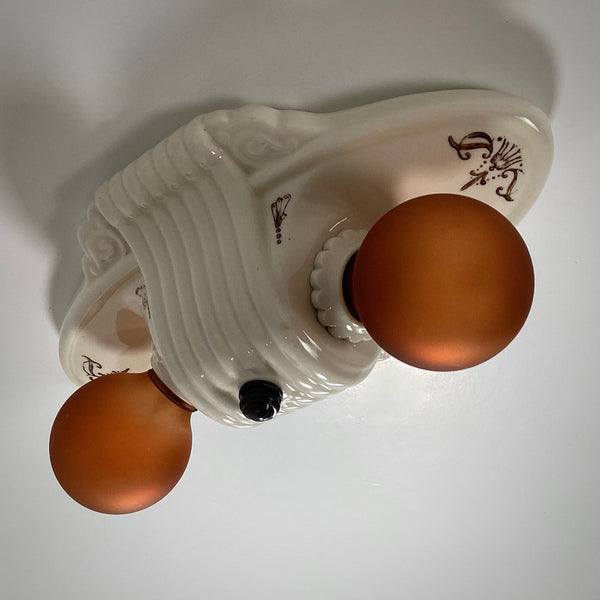 Vintage Flush Mount Porcelain Ceiling Light Fixture. This beautiful antique porcelain ceiling light fixture with uranium glass glaze features a classic 1930s design. Available at www.vintporium.com