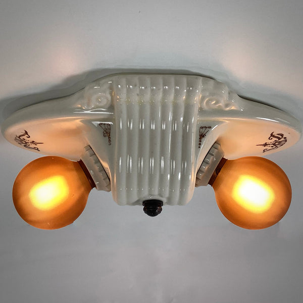 Vintage Flush Mount Porcelain Ceiling Light Fixture. This beautiful antique porcelain ceiling light fixture with uranium glass glaze features a classic 1930s design. Available at www.vintporium.com