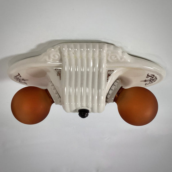 Vintage Flush Mount Porcelain Ceiling Light Fixture. This beautiful antique porcelain ceiling light fixture with uranium glass glaze features a classic 1930s design. Available at www.vintporium.com