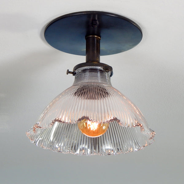 Contemporary Semi-Flush Holophane Ceiling Light Fixture. The fixture has new wiring, bronze-glazed porcelain sockets, etc. The fixture has been cleaned and detailed, including mounting hardware for easy installation. Available at www.vintporium.com