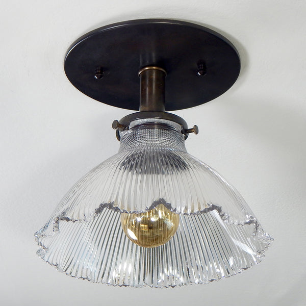 Contemporary Semi-Flush Holophane Ceiling Light Fixture. The fixture has new wiring, bronze-glazed porcelain sockets, etc. The fixture has been cleaned and detailed, including mounting hardware for easy installation. Available at www.vintporium.com