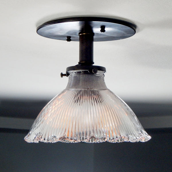 Contemporary Semi-Flush Holophane Ceiling Light Fixture. The fixture has new wiring, bronze-glazed porcelain sockets, etc. The fixture has been cleaned and detailed, including mounting hardware for easy installation. Available at www.vintporium.com
