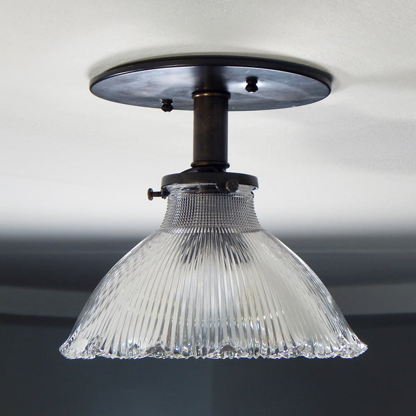 Contemporary Semi-Flush Holophane Ceiling Light Fixture. The fixture has new wiring, bronze-glazed porcelain sockets, etc. The fixture has been cleaned and detailed, including mounting hardware for easy installation. Available at www.vintporium.com