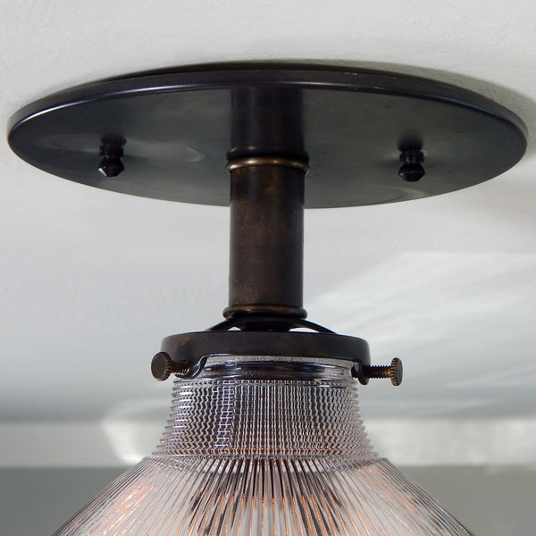 Contemporary Semi-Flush Holophane Ceiling Light Fixture. The fixture has new wiring, bronze-glazed porcelain sockets, etc. The fixture has been cleaned and detailed, including mounting hardware for easy installation. Available at www.vintporium.com
