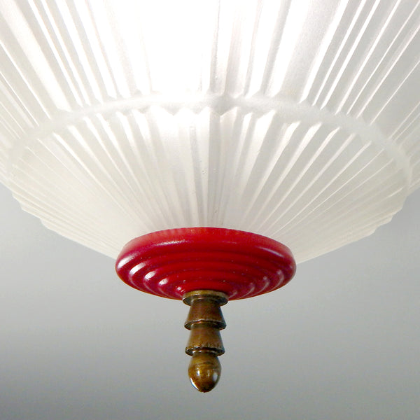 Antique Art Deco / Machine Aged Semi Flush Ceiling Light Fixture. The fixture has been restored and features a deep red with antique brass highlights. The fixture has been cleaned and detailed and comes with hardware for a convenient installation. Available at www.vintporium.com