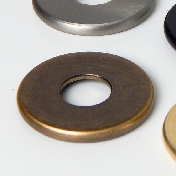 Solid brass 1-inch check ring with a 1/8 ip slip center hole are sold individually. The check ring come in your choice of satin nickel, polished nickel, unfinished brass, antique brass, and oil-rubbed bronze. Available at www.vintporium.com