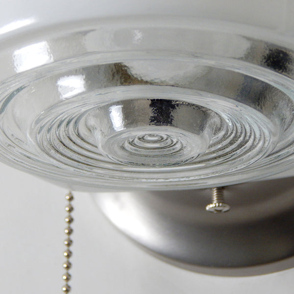 Post-War Era Pull Chain Sconce Vintage Glass Shade New Fixture Base. The fixture features a vintage enameled glass shade and a new pull chain fixture. The light comes with installation hardware, making it convenient to install. Available at www.vintporium.com