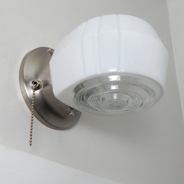 Post-War Era Pull Chain Sconce Vintage Glass Shade New Fixture Base. The fixture features a vintage enameled glass shade and a new pull chain fixture. The light comes with installation hardware, making it convenient to install. Available at www.vintporium.com