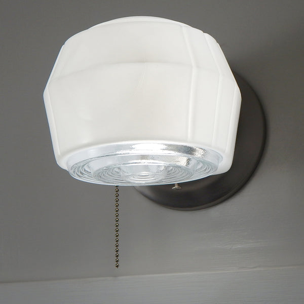 Post-War Era Pull Chain Sconce Vintage Glass Shade New Fixture Base. The fixture features a vintage enameled glass shade and a new pull chain fixture. The light comes with installation hardware, making it convenient to install. Available at www.vintporium.com