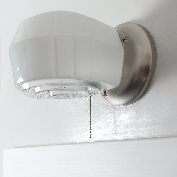 Post-War Era Pull Chain Sconce Vintage Glass Shade New Fixture Base. The fixture features a vintage enameled glass shade and a new pull chain fixture. The light comes with installation hardware, making it convenient to install. Available at www.vintporium.com