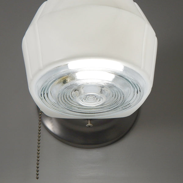Post-War Era Pull Chain Sconce Vintage Glass Shade New Fixture Base. The fixture features a vintage enameled glass shade and a new pull chain fixture. The light comes with installation hardware, making it convenient to install. Available at www.vintporium.com