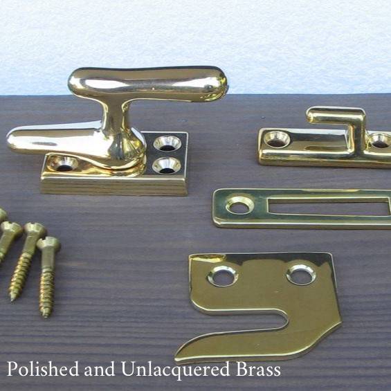Polished and unlacquered casement window lock set with screws — Vintporium vintage hardware