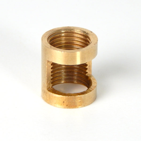 Solid brass coupling is used to connect two 1/8 ip threaded rods while allowing wires to exit or enter at the knuckle. Available at www.vintporium.com