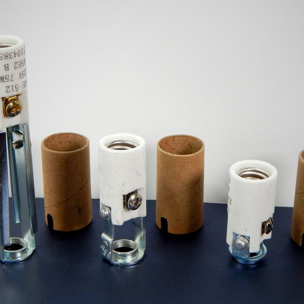 Set of porcelain candelabra sockets with screw terminals and paper insulating sleeves from Vintporium.