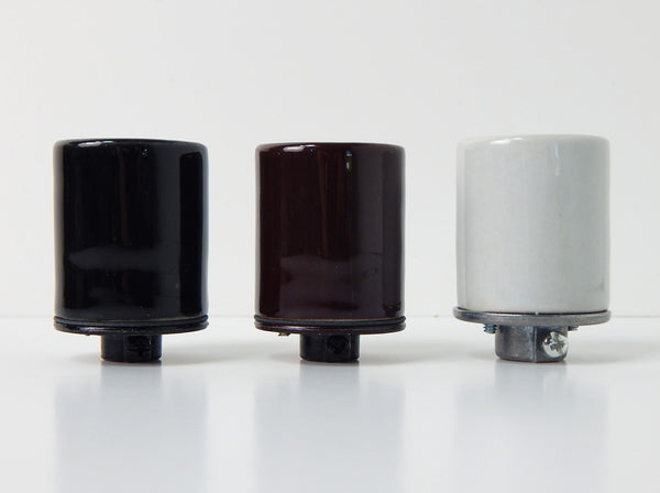 Glazed Porcelain Medium Based Socket with 1/8 ip thread in your choice of Black, Bronze or White. The sockets come complete with set screw and metal cap. Available at www.vintporium.com