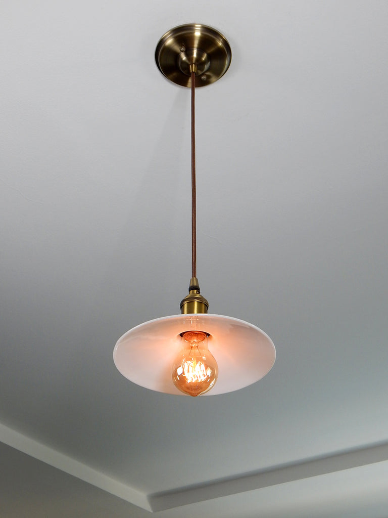 Cafe style pendant light fixture featuring vintage opal glass shade and new antique brass fixture. Available at www.vintporium