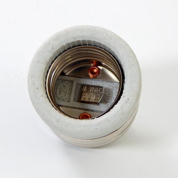 Mogul Base E39 to Medium Base E26 socket adapter enables you to use Edison/medium base bulbs in mogul base sockets. Available at www.vintporium.com