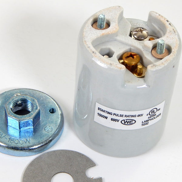 Mogul base glazed porcelain socket complete with 1/4 ip cap and two wire ways cast into the porcelain. Available at www.vintporium.com
