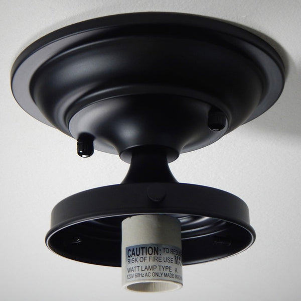 Bring new life to those old ceiling light fixtures by swapping out the old fixture bases for this Moderne 4 inch Schoolhouse Fixture. It will complement many glass shades with its crisp lines and complementary angles in your choice of antique brass, satin brass, black, bronze, polished nickel, and satin nickel finish.. Available at www.vintporium.com