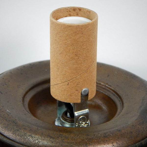Finally an alternative to those plastic candelabra sockets. These high heat porcelain sockets are strong, durable and attractive. The sockets feature screw terminals, paper shell, and 1/8 ip threaded mount. They come in three sizes: 1 9/16 inch, 2 inches, and our adjustable 3 1/2 to 4 5/8 inch tall socket. Available at www.vintporium.com