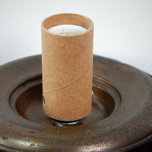 Finally an alternative to those plastic candelabra sockets. These high heat porcelain sockets are strong, durable and attractive. The sockets feature screw terminals, paper shell, and 1/8 ip threaded mount. They come in three sizes: 1 9/16 inch, 2 inches, and our adjustable 3 1/2 to 4 5/8 inch tall socket. Available at www.vintporium.com