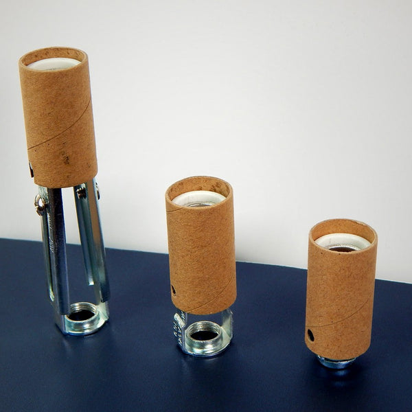 Finally an alternative to those plastic candelabra sockets. These high heat porcelain sockets are strong, durable and attractive. The sockets feature screw terminals, paper shell, and 1/8 ip threaded mount. They come in three sizes: 1 9/16 inch, 2 inches, and our adjustable 3 1/2 to 4 5/8 inch tall socket. Available at www.vintporium.com