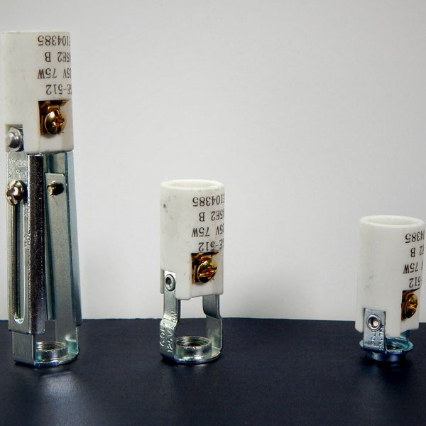 Finally an alternative to those plastic candelabra sockets. These high heat porcelain sockets are strong, durable and attractive. The sockets feature screw terminals, paper shell, and 1/8 ip threaded mount. They come in three sizes: 1 9/16 inch, 2 inches, and our adjustable 3 1/2 to 4 5/8 inch tall socket. Available at www.vintporium.com