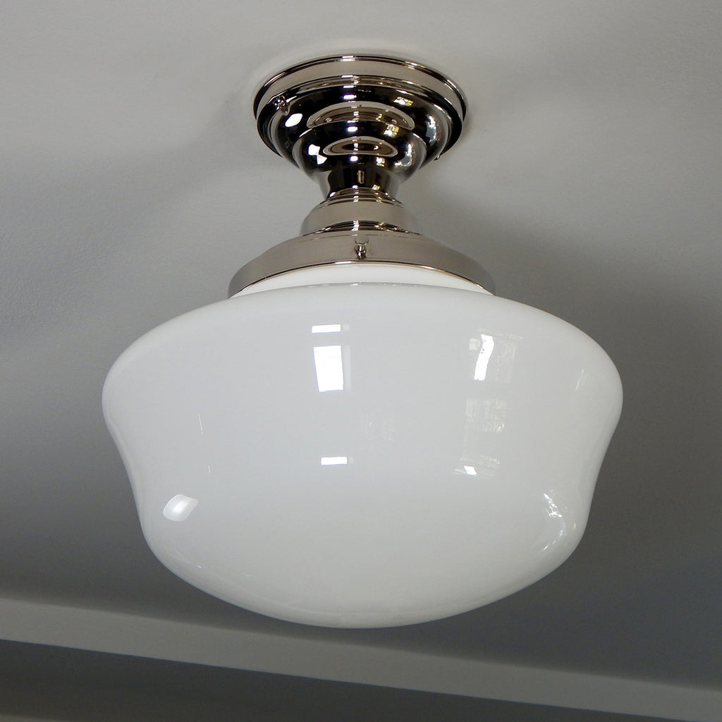 Semi-flush ceiling light featuring a vintage opal glass shade and a new polished nickel fixture. For your convenience, the piece has been cleaned, detailed, and is ready to install. Available at www.vintporium.com