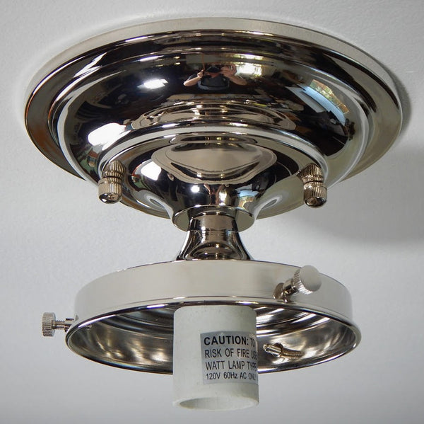 Bring new life to those old ceiling light fixtures by swapping out the old fixture bases for this Moderne 4 inch Schoolhouse Fixture. It will complement many glass shades with its crisp lines and complementary angles in your choice of antique brass, satin brass, black, bronze, polished nickel, and satin nickel finish.. Available at www.vintporium.com